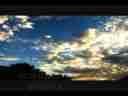 Catalog#:V03012HD License:$62.00, Format:1920x1080p Indeo 4.5/5.1 (.AVI) at 30fps, Length:20 sec. Slow mottled high cloud drift sunrise time lapse(3)