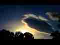 Catalog#:V07403 License:$216.00, Format:1920x1080p Indeo 4.5/5.1 (.AVI) at 30fps, Length:49 sec. Irridescent 'UFO' lenticular cloud morphing sunset timelapse