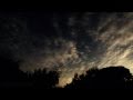 Catalog#:V08619 License:$192.00, Format:1920x1080 Motion JPEG(.AVI) at 30fps, Length: approx.59 sec. Interesting long multi-layer cloud timelapse sunset