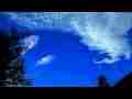 Catalog#:V10843a License:$156.00, Format:1920x1080 Motion JPEG(.AVI) at 30fps, Length: approx.47 sec. Cirrus cloud wave forming timelapse (zoomed irridescent patches) 1